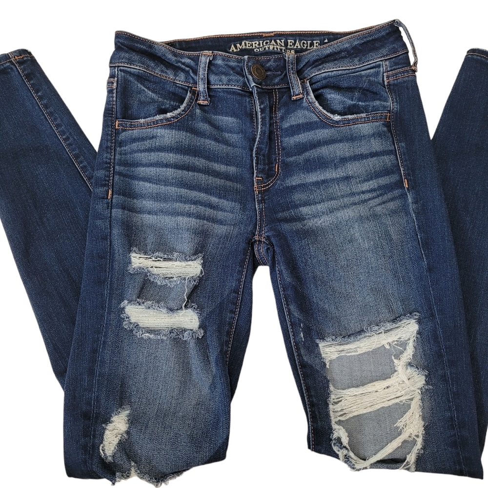 American Eagle Size 4 super stretch Distressed skinny jeans